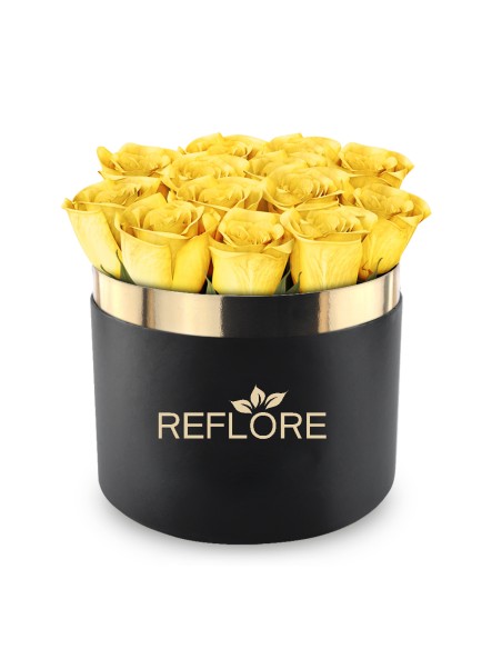 Black cylinder box with stabilized yellow roses