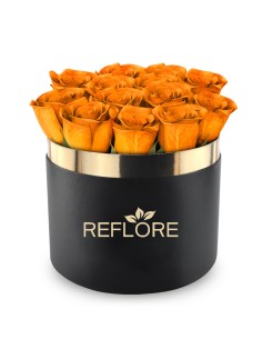 Black cylinder box with stabilized orange roses